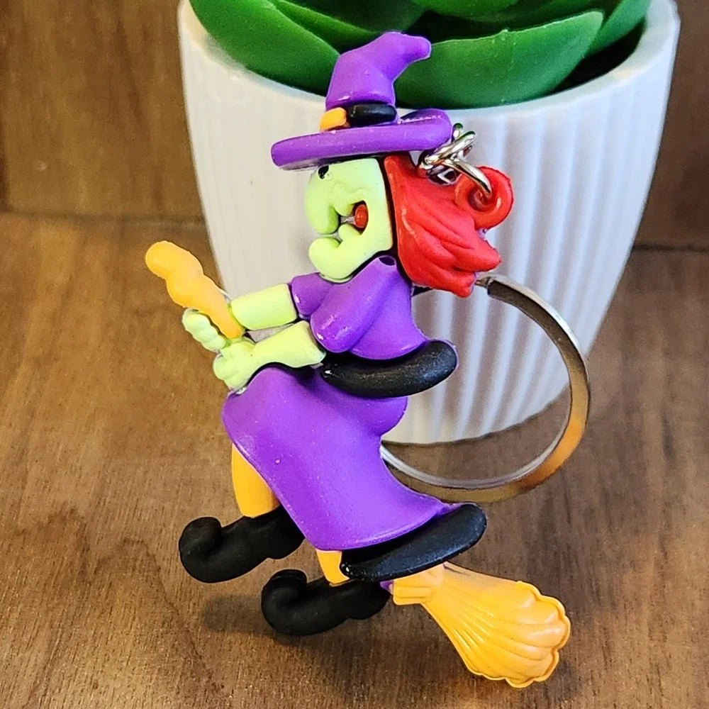 Vintage Style Halloween Witch on Broomstick Keychain Purple Green 2.75